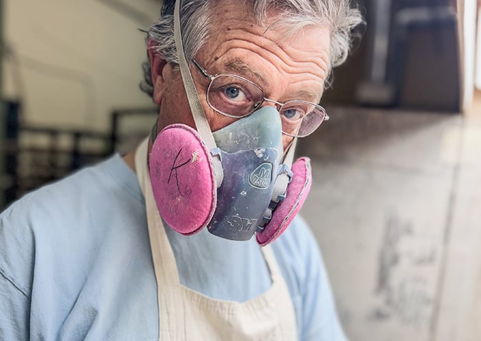 Kenneth Spraying Glaze on Cary Pottery Custom Crocks